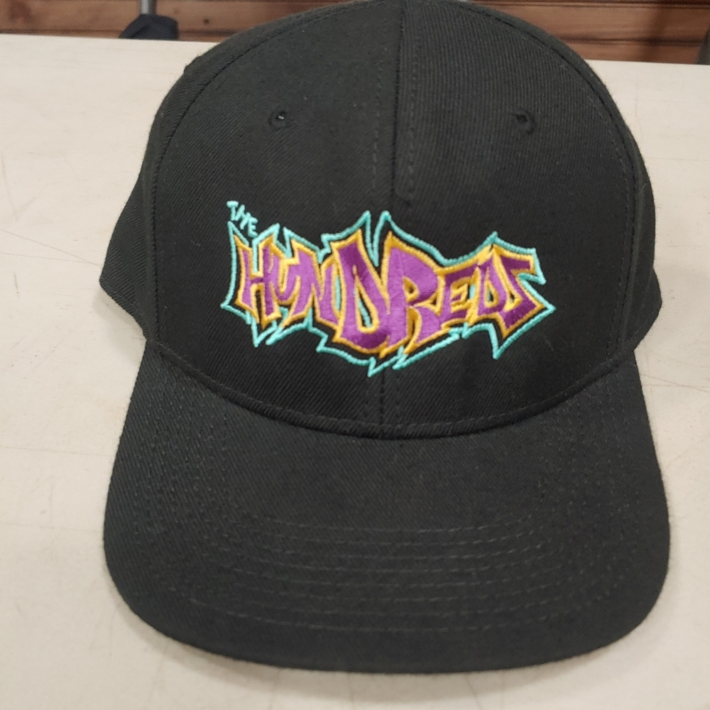 2 hats. The hundreds.  Pit bull.